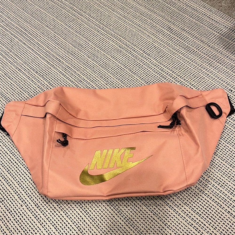 Nike tech bag basically a larger Fanny pack. New without tags.